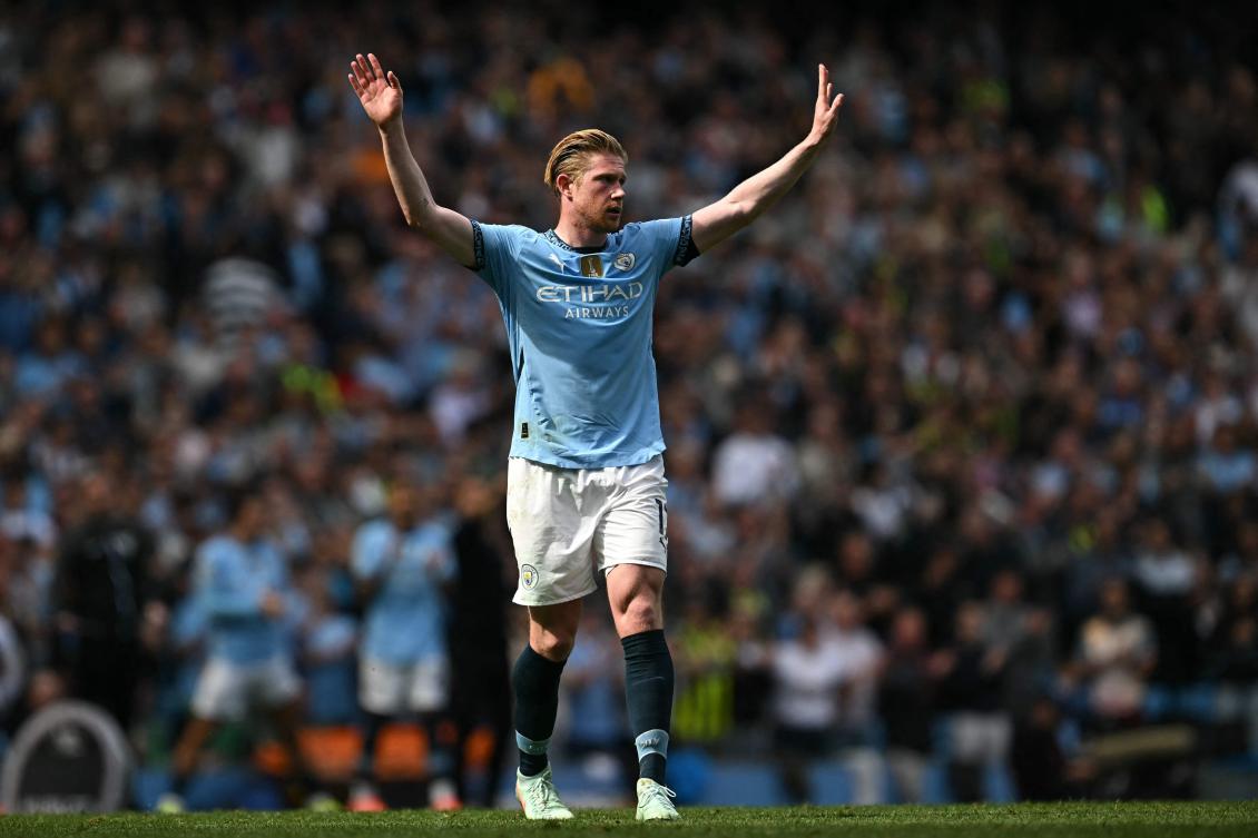 Manchester City's Belgian midfielder Kevin De Bruyne reacts as he is substituted during the English Premier League football match between Manchester City and Crystal Palace at the Etihad Stadium. (AFP)