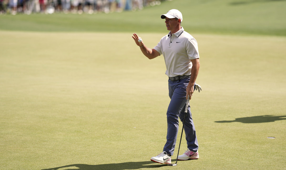 Rory McIlroy, of Northern Ireland, waves after making a putt on the sixth hole during the third round at the Masters golf tournament, Saturday, April 12, 2025, in Augusta, Ga. (AP)
