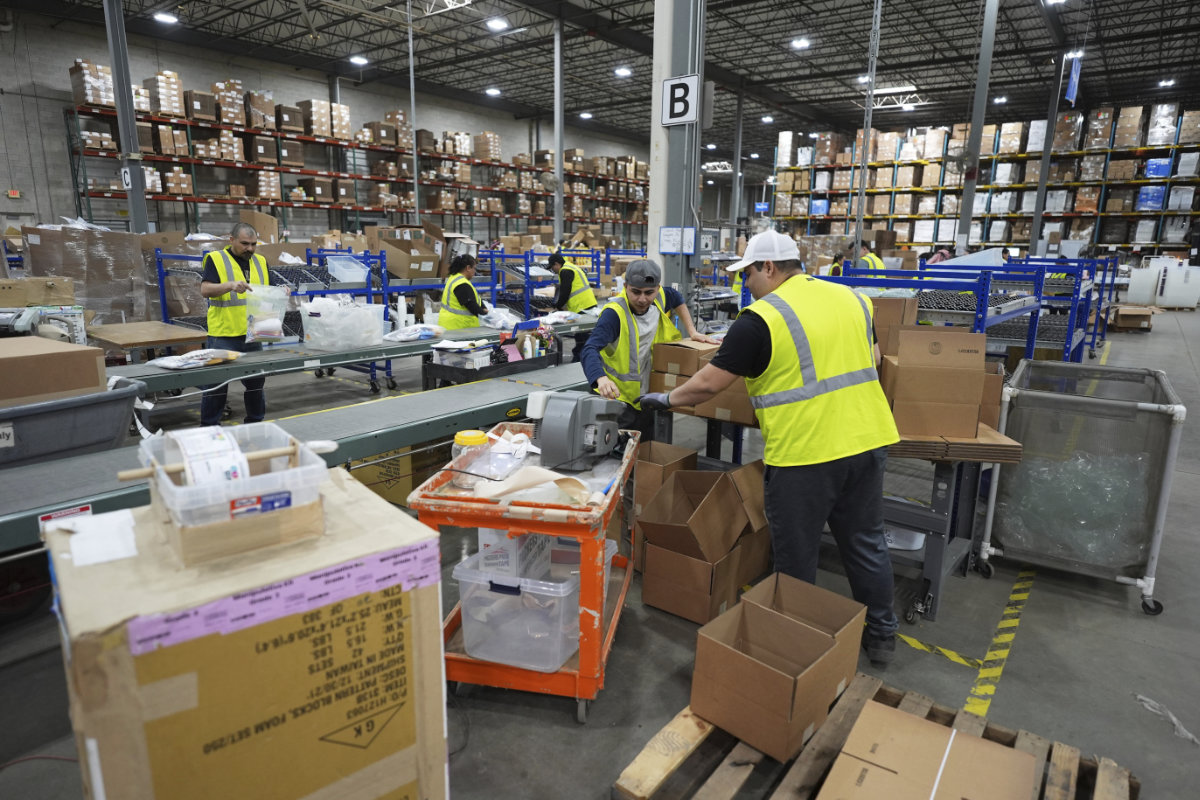 Employees of Learning Resources, an educational toy company, work at a warehouse in Vernon Hills, Illinois, on April 11, 2025. (AP Photo)