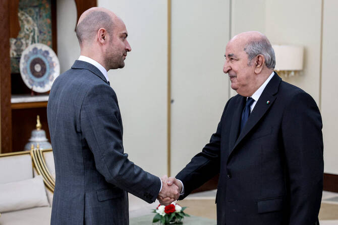 This handout photograph released by French Ministry for Europe and Foreign Affairs shows France's Foreign Minister Jean-Noel Barrot (L) being received by Algeria's President Abdelmajid Tebboune in Algiers on April 6, 2025. (AFP)