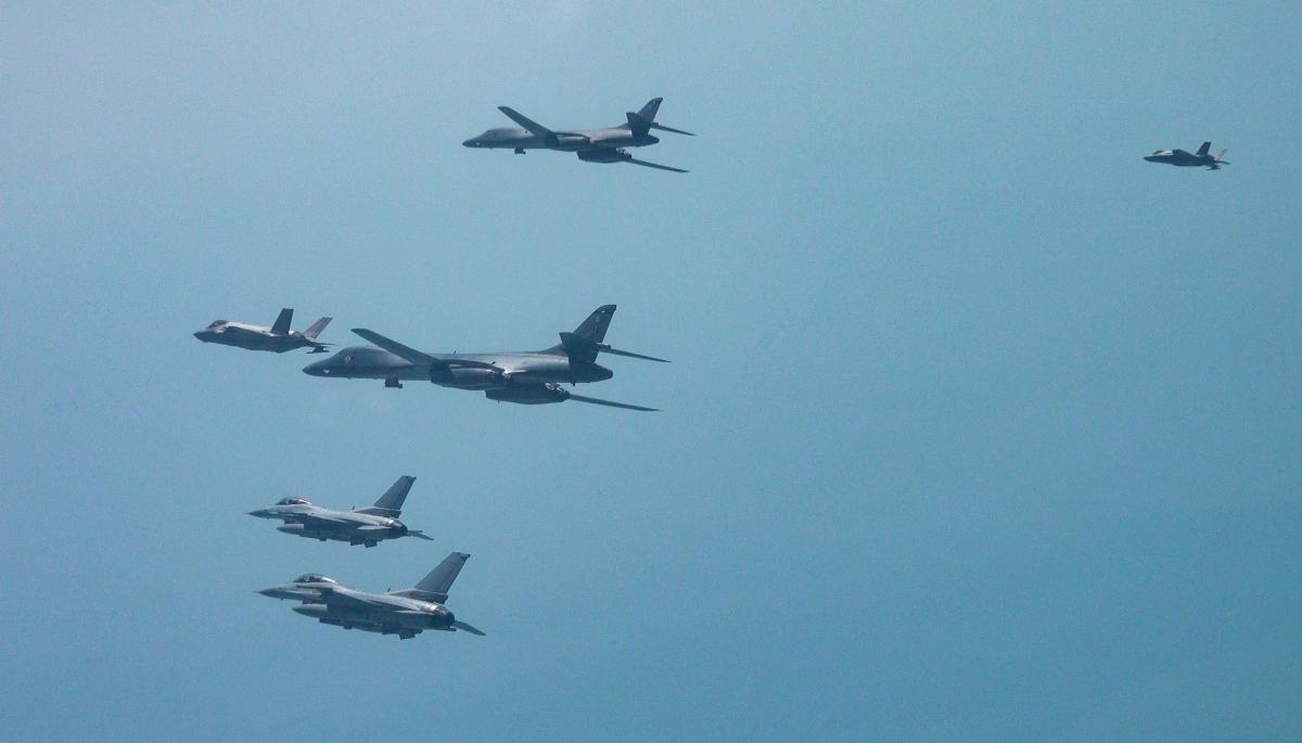 Two US Air Force B-1B bombers, South Korean Air Force F-35A and F-16 fighter jets and US Air Force F-16 fighter jets fly over South Korea during a joint air drill on April 15, 2025. (South Korean Defense Ministry/AFP)