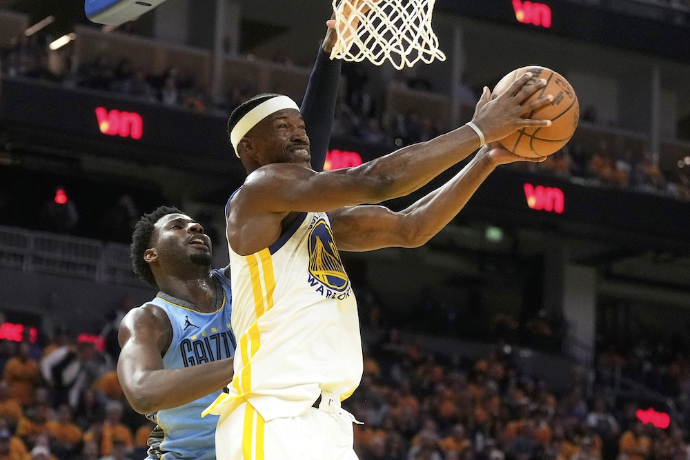 Butler, Curry lead Warriors past Grizzlies 121-116 to secure seventh seed in West playoffs