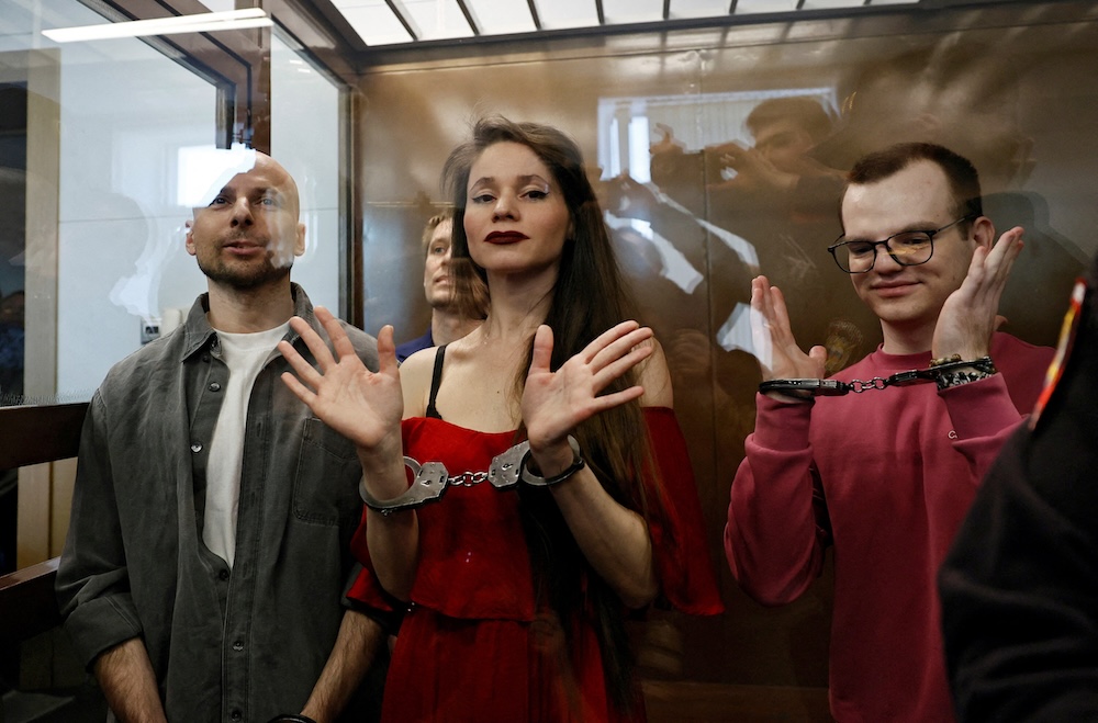 From left: Russian journalists Sergei Karelin, Konstantin Gabov, Antonina Kravtsova and Artem Kriger, were found guilty of ‘participating in an extremist group’ over collaborating with the banned organizations of late opposition leader Alexei Navalny. (Reuters)