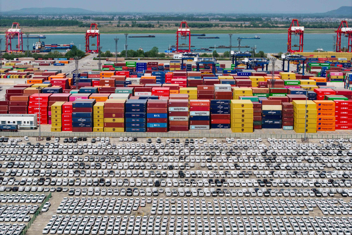 Chinese made cars, including Volvo and other brands, are seen at the port in Nanjing, in China’s eastern Jiangsu province on April 16, 2025, as they wait to be loaded onto ships for export.(AFP)