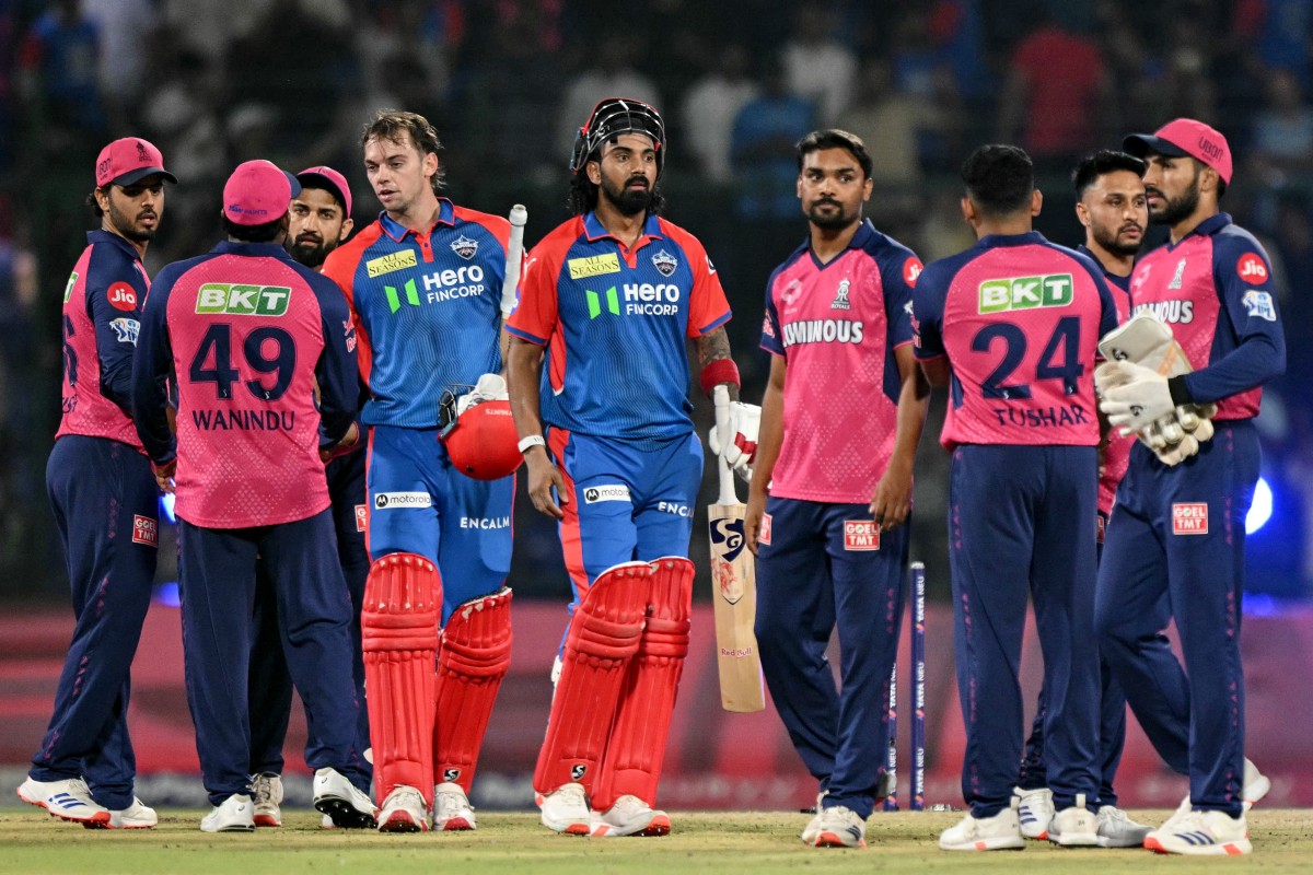 Delhi Capitals' Tristan Stubbs (3L) and KL Rahul (C) are congratulated by Rajasthan Royals' players after their team's win at the end of the super over of the Indian Premier League (IPL) Twenty20 cricket match between Delhi Capitals and Rajasthan Royals at the Arun Jaitley Stadium in New Delhi on April 16, 2025.(AFP)