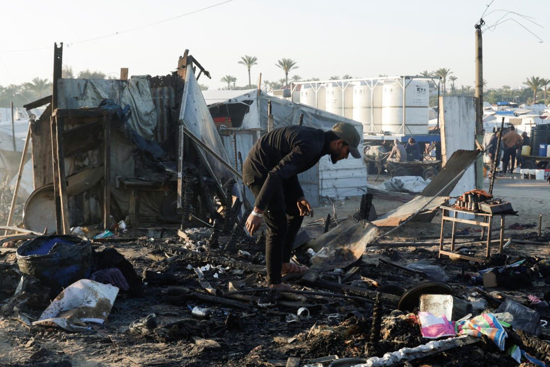 A wave of Israeli air strikes hit multiple encampments for displaced Palestinians across the territory, killing at least 25 people. (Reuters)