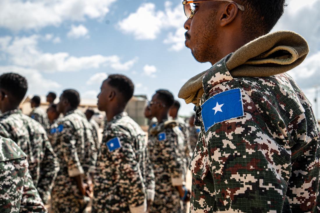 A Somali National Army soldier stands at attention during the morning briefing for trainee officers at the General Dhagabadan Training Centre in Mogadishu. (AFP)
