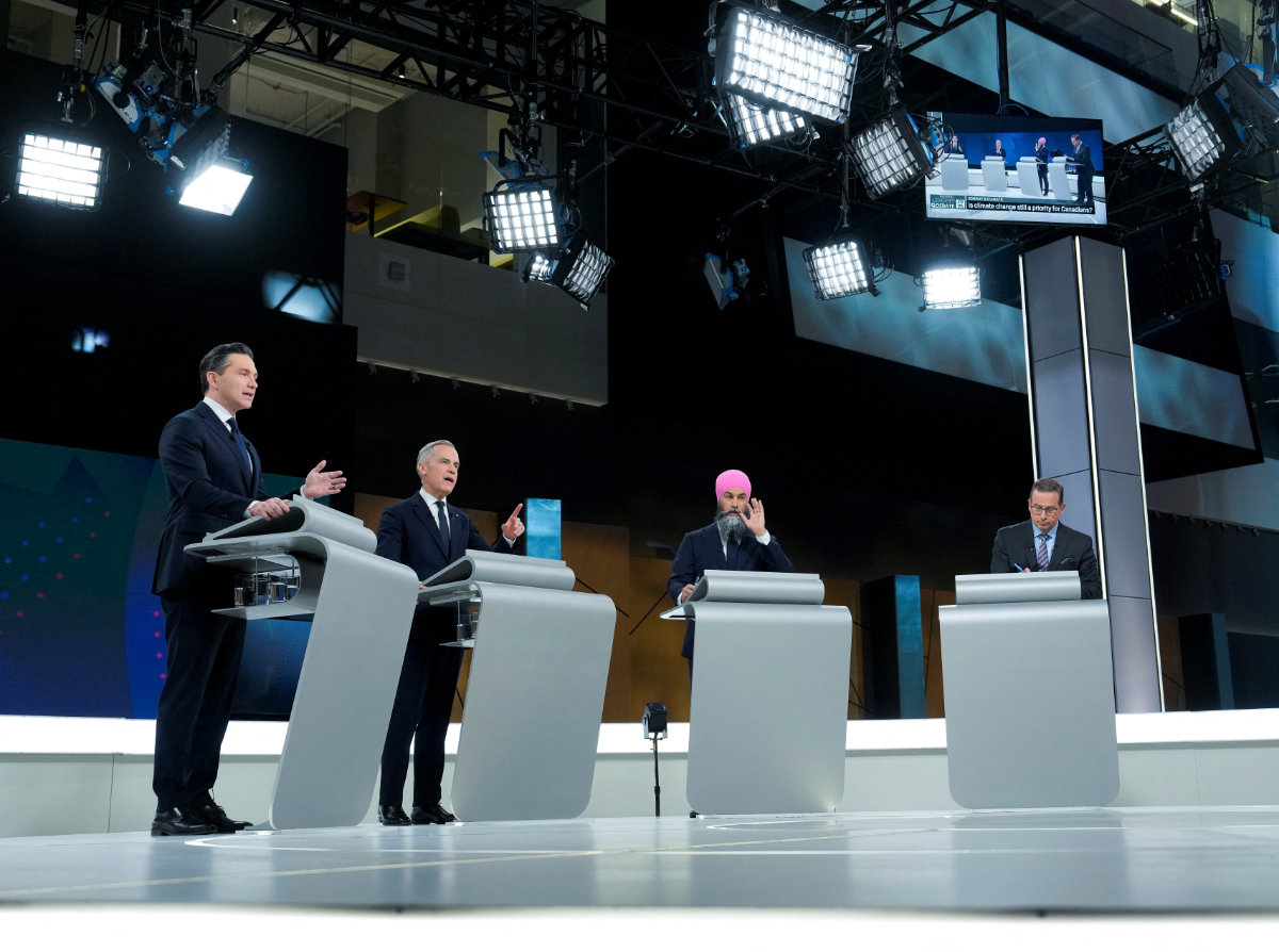 (Left to right) Conservative Party's Pierre Poilievre, Liberal Party'/s Mark Carney, New Democratic Party's Jagmeet Singh and Bloc Quebecois' Yves-Francois Blanchet participate in the English-language federal leaders' debate in Montreal on April 17, 2025. (Pool via REUTERS)