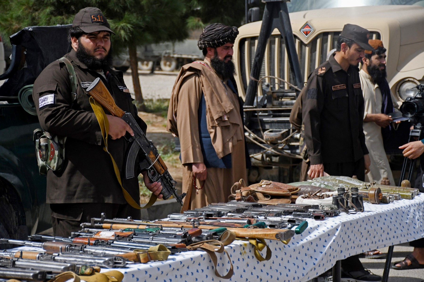 Taliban security personnel display seized weapons in Mazar-i-Sharif district of Balkh province on August 29, 2023. (AFP/File Photo)