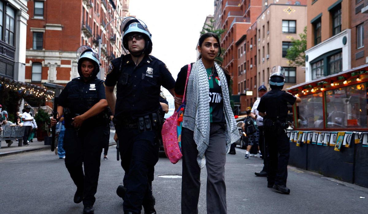 Police detain a pro-Palestine demonstrator during a protest march in New York City on July 18, 2024. (AFP)