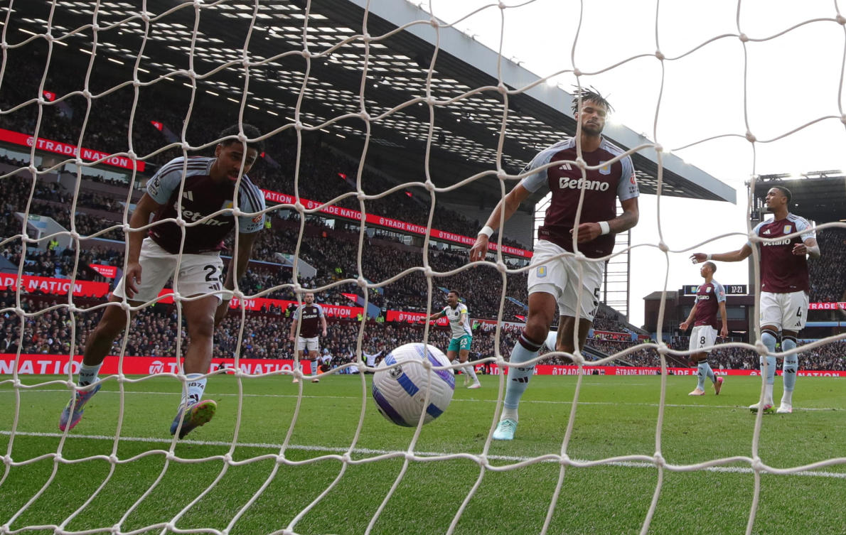 Aston Villa’s Ian Maatsen and Tyrone Mings look dejected after Newcastle United’s Fabian Schar scores their first goal during their EPL match at Villa Park, Birmingham, Britain — Apr. 19, 2025. (Reuters)