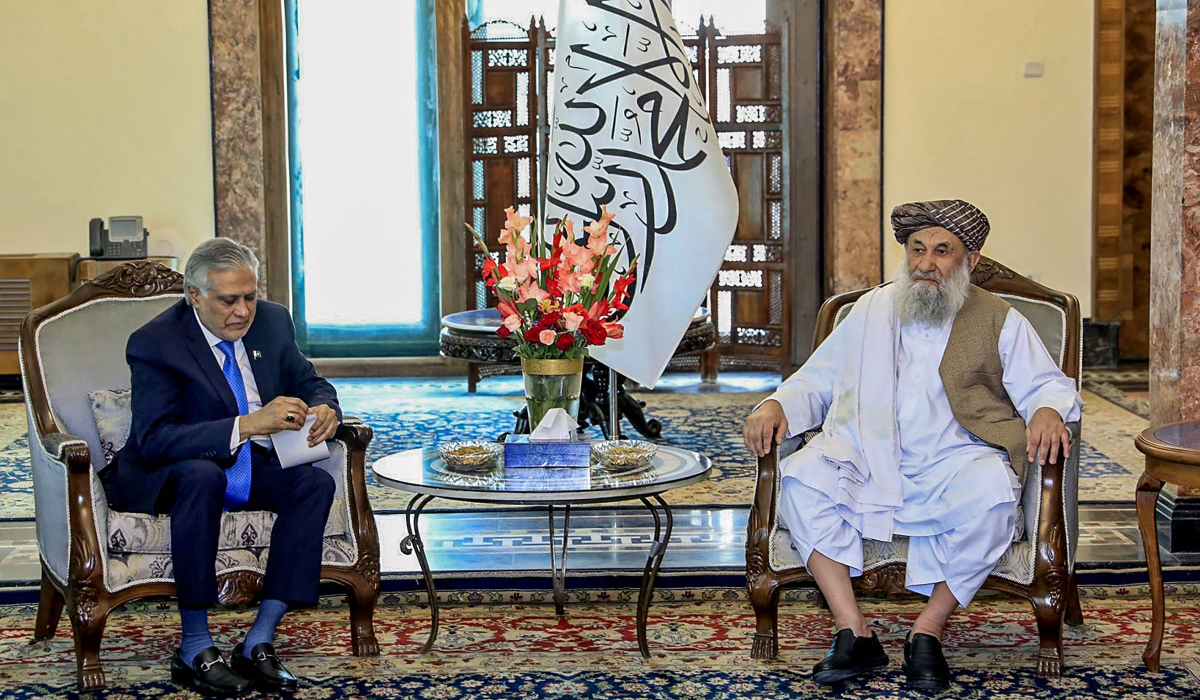 Pakistan’s Deputy Prime Minister Ishaq Dar with Afghanistan’s Premier Mullah Mohammed Hassan Akhund during a meeting in Kabul on Saturday. (AP)