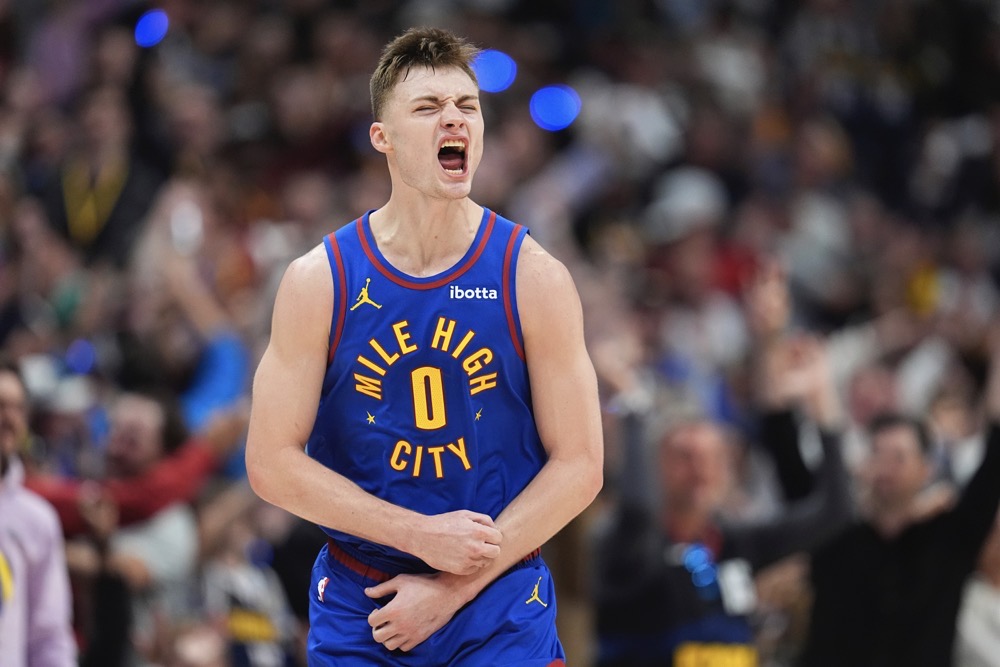 Denver Nuggets guard Christian Braun reacts after hitting a 3-point basket. (AP)