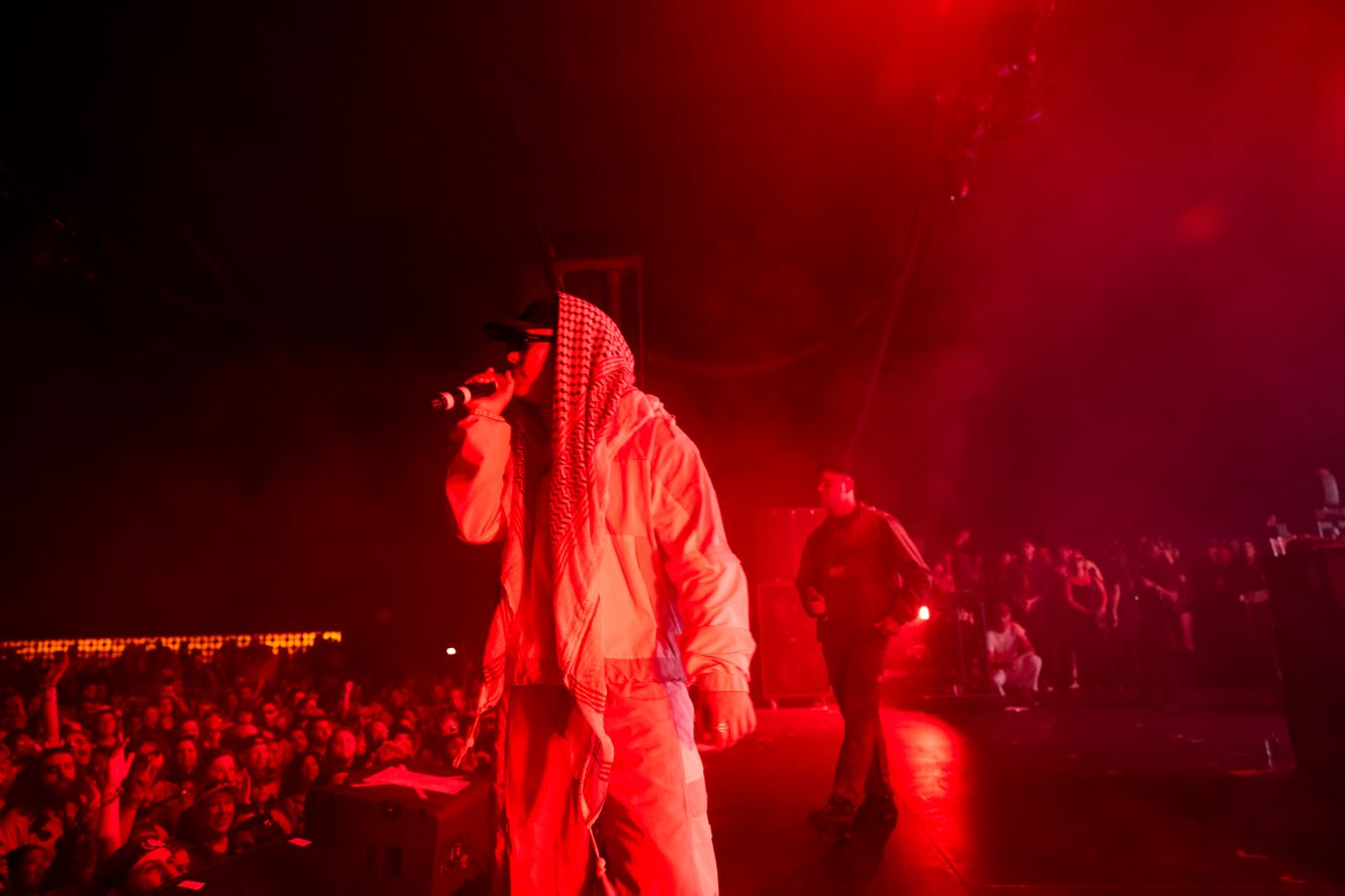 Kneecap rapper Moglai Bap wore a keffiyeh at the Coachella music festival in California. (Getty Images)