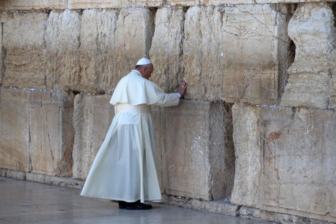 Pope Francis prays at the Western Wall, Judaism's holiest site, in East Jerusalem's Old City. (File/AFP)
