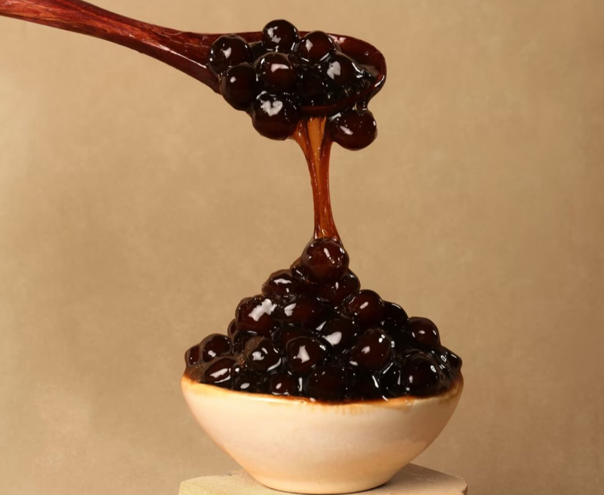 Brown sugar dreams — chewy pearls, rich syrup, and that perfect glossy finish. WHOA Tea knows how to do boba right. (Supplied)