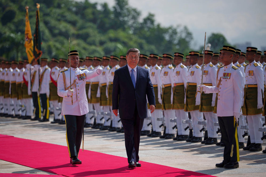 Chinese President Xi Jinping inspects honour guards during a welcoming ceremony. (AFP)
