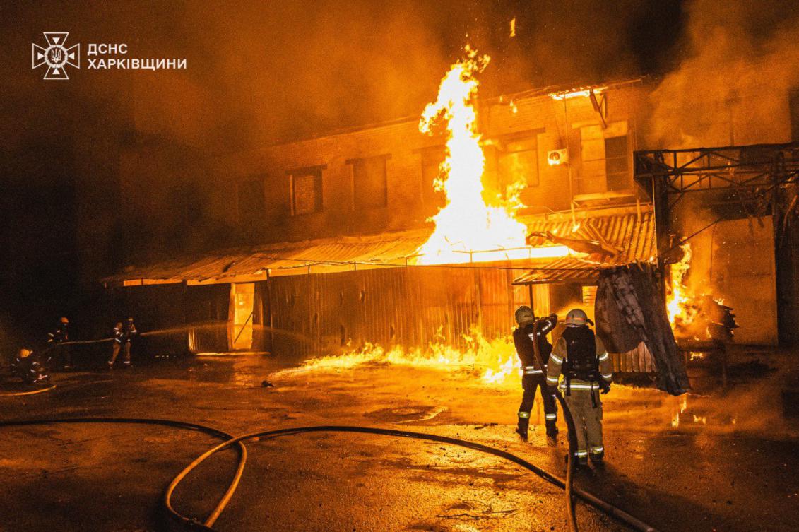 Firefighters extinguish a fire following a drone attack in Poltava. (AFP)