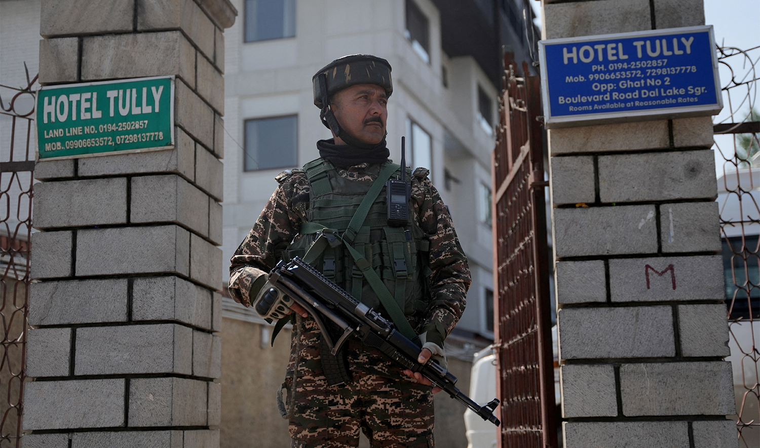 An Indian security force personnel stands guard outside a hotel in Srinagar, following a suspected militant attack near south Kashmir's scenic Pahalgam, on April 23, 2025. (REUTERS)