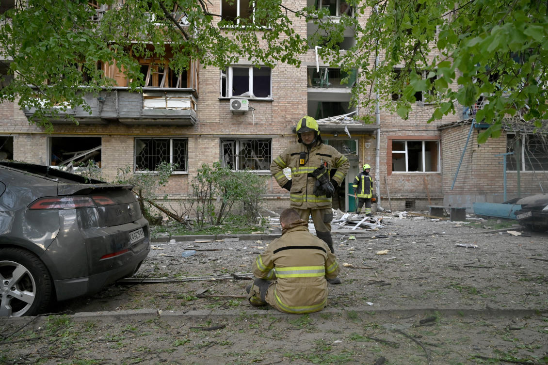 Ukrainian rescuers operate at the site of a Russian missile attack in Kyiv on April 24, 2025. (AFP)