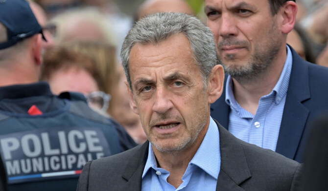French President Emmanuel Macron on Thursday said he opposed stripping former head of state Nicolas Sarkozy of France's top honour despite the definitive conviction of the right-winger last year on charges of influence-peddling and corruption. (AFP/File)