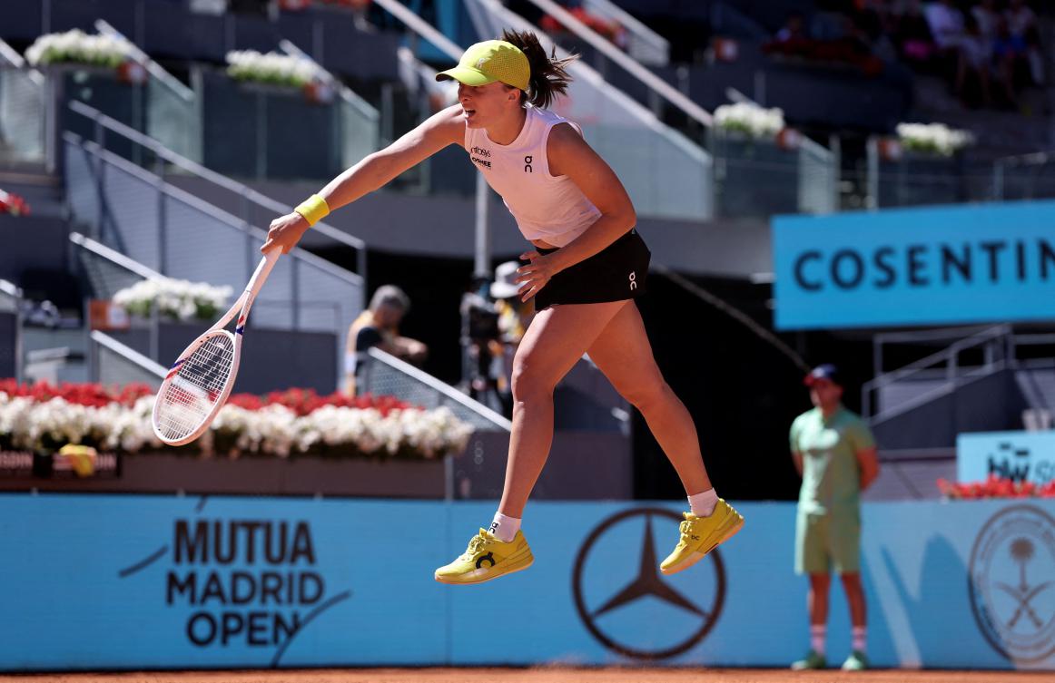 Poland’s Iga Swiatek returns the ball to Philippines’ Alexandra Eala during their 2025 WTA Tour Madrid Open tennis tournament second round singles match at the Caja Magica in Madrid, on Apr. 24, 2025. (AFP)