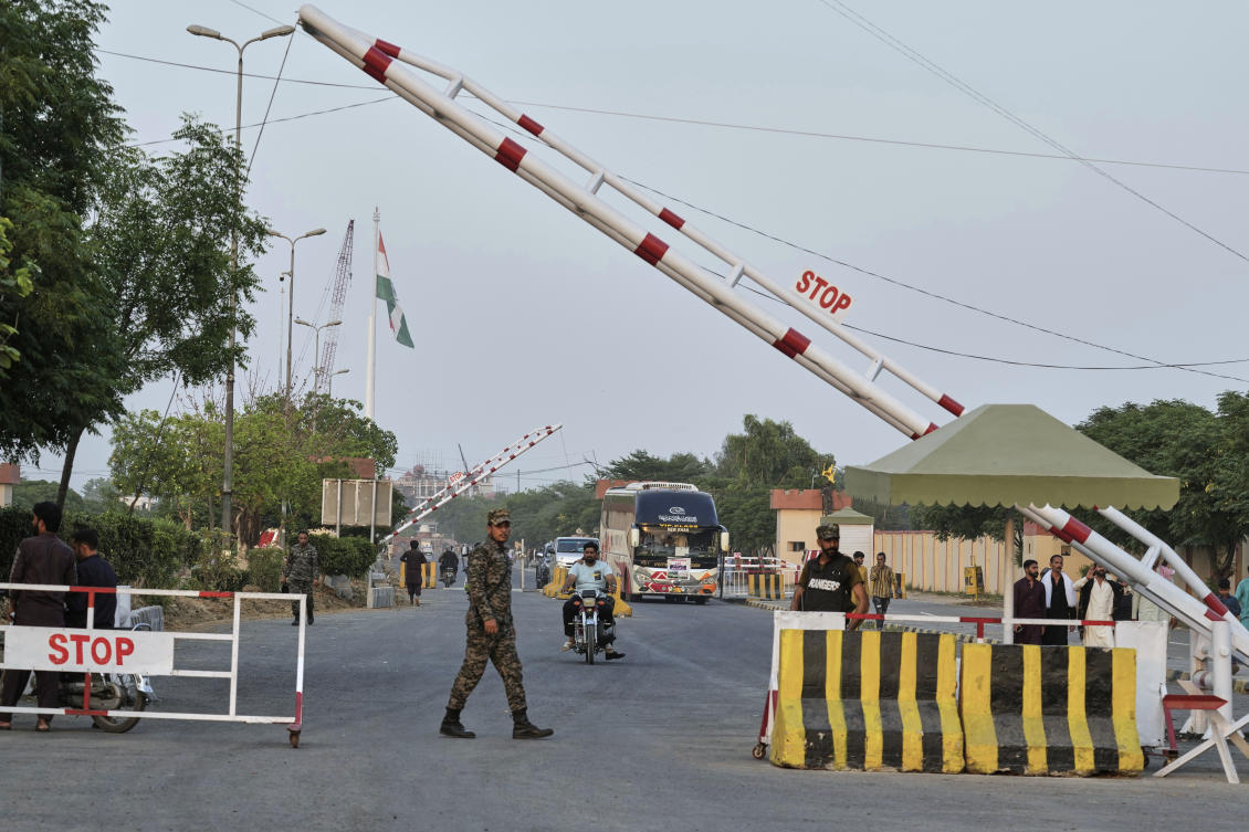 Pakistan’s paramilitary soldiers stand guard at a checkpoint near Wahag, a joint border crossing point between the Pakistan and India border on April 24, 2025. (AP)