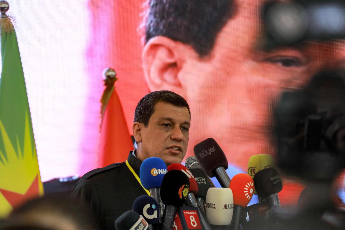Mazloum Abdi, commander-in-chief of the Syrian Democratic Forces, speaks during pan-Kurdish conference in Qamishli in northeastern Syria, Apr. 26, 2025. (AFP)