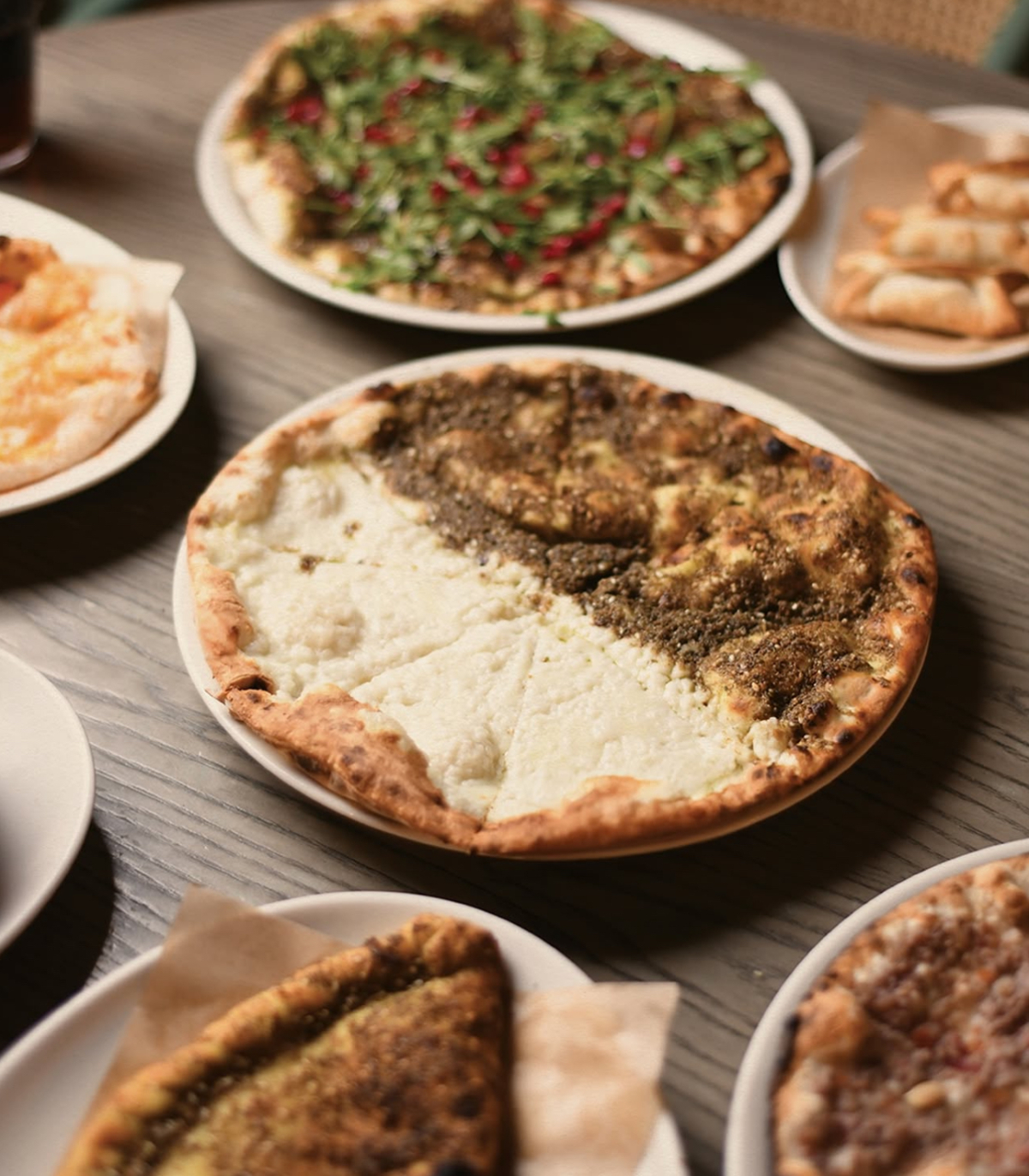 The zaatar and cheese manakeesh are baked to perfection — crisp on the outside, soft inside, and bursting with flavor. A Lebanese classic done right. (Supplied)