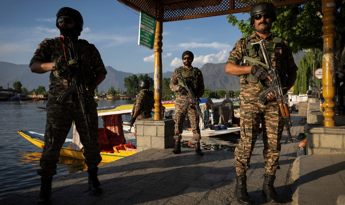 Indian security force personnel stand guard on the banks of Dal Lake, following a suspected militant attack near south Kashmir's Pahalgam, in Srinagar April 25, 2025. (Reuters)