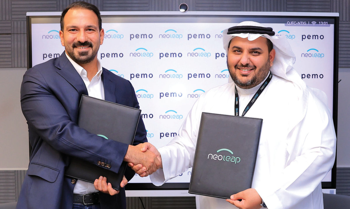 Ayham Gorani, co-founder of Pemo, and Abdullah Albrahim, CEO of neoleap, sign the partnership.