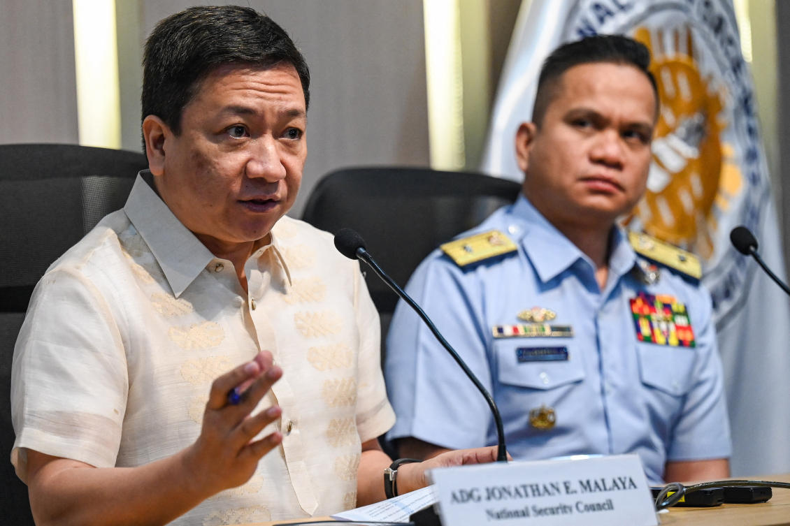 Assistant Director-General of the Philippines’ National Security Council Jonathan Malaya (L). (File/AFP)