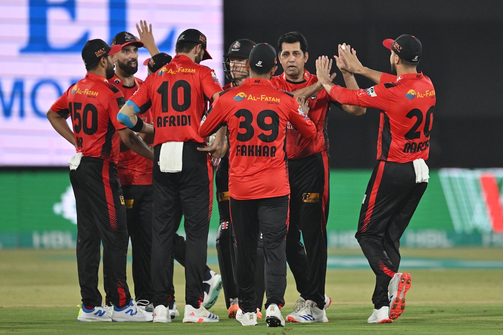 Lahore Qalandars players celebrate the dismissal of Karachi Kings’ wicketkeeper Tim Seifert during their Pakistan Super League Twenty20 cricket match in Karachi on April 15, 2025. (AFP)