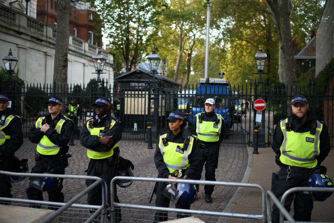 Police officers stand on duty at a road leading to the Embassy of Israel, as people take part in a 'Stand with Palestine' demonstration, in west London on October 9, 2023. (File/AFP)