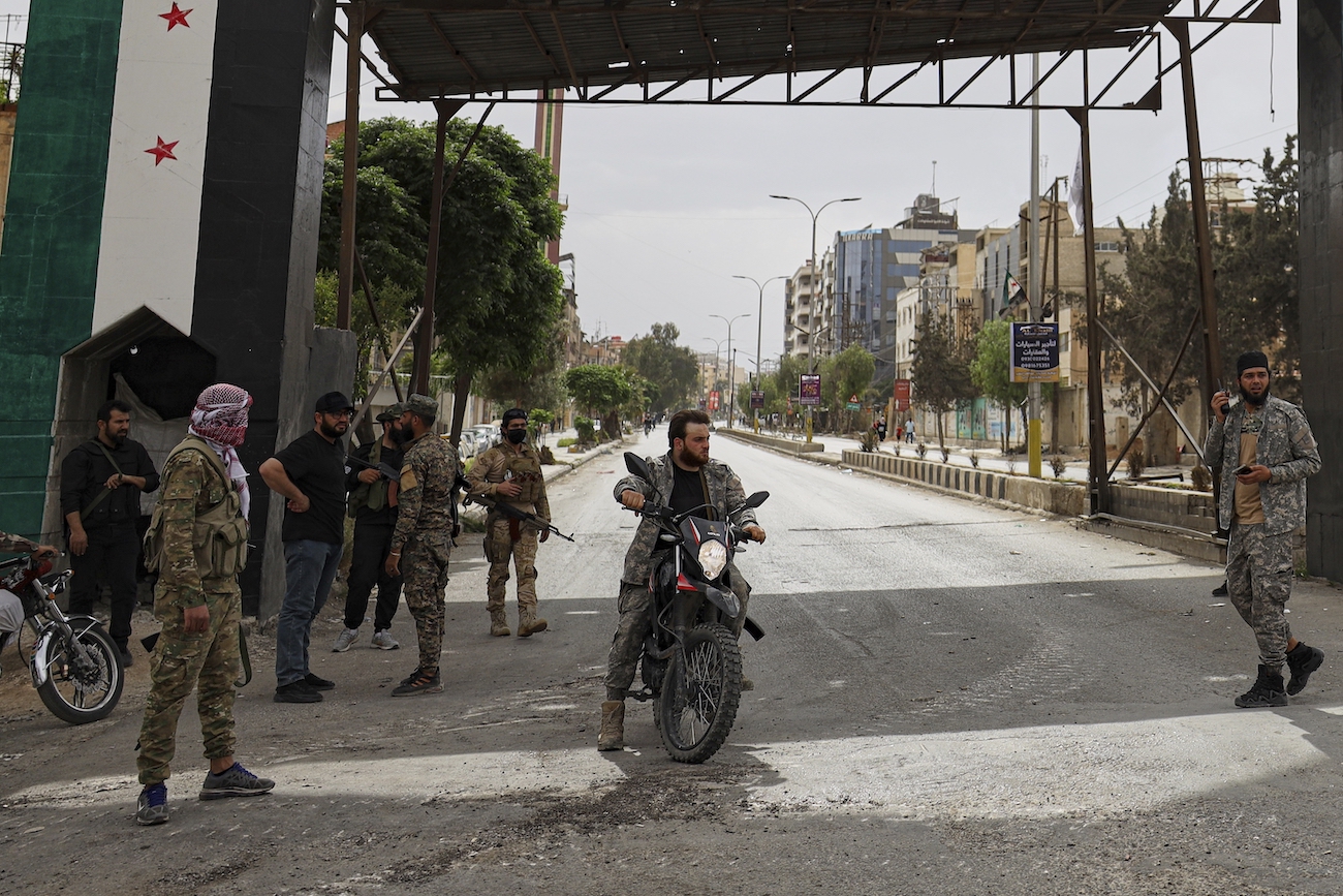Members of Syria’s security forces deploy during an operation on the outskirts of the town of Sahnaya, south of Damascus, Wednesday, April 30, 2025. (AP)