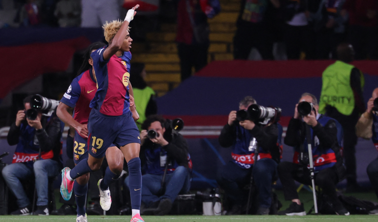 Barcelona's Spanish forward #19 Lamine Yamal celebrates scoring his team's first goal during the UEFA Champions League semi final first leg football match between FC Barcelona and Inter Milan at the Estadi Olimpic Lluis Companys in Barcelona on April 30, 2025. (AFP)