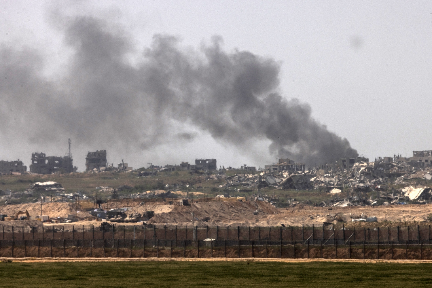 Israel is drawing a security belt by fire in Gaza, the same way it did when it decimated Lebanese border villages (File/AFP)