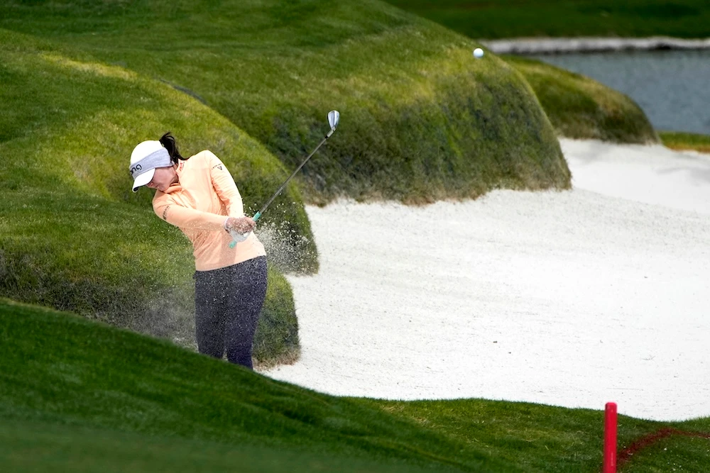 Brittany Altomare hits from a bunker along the fourth fairway during the first round of the LPGA T-Mobile Match Play golf tournament Wednesday in North Las Vegas, Nevada. (AP)