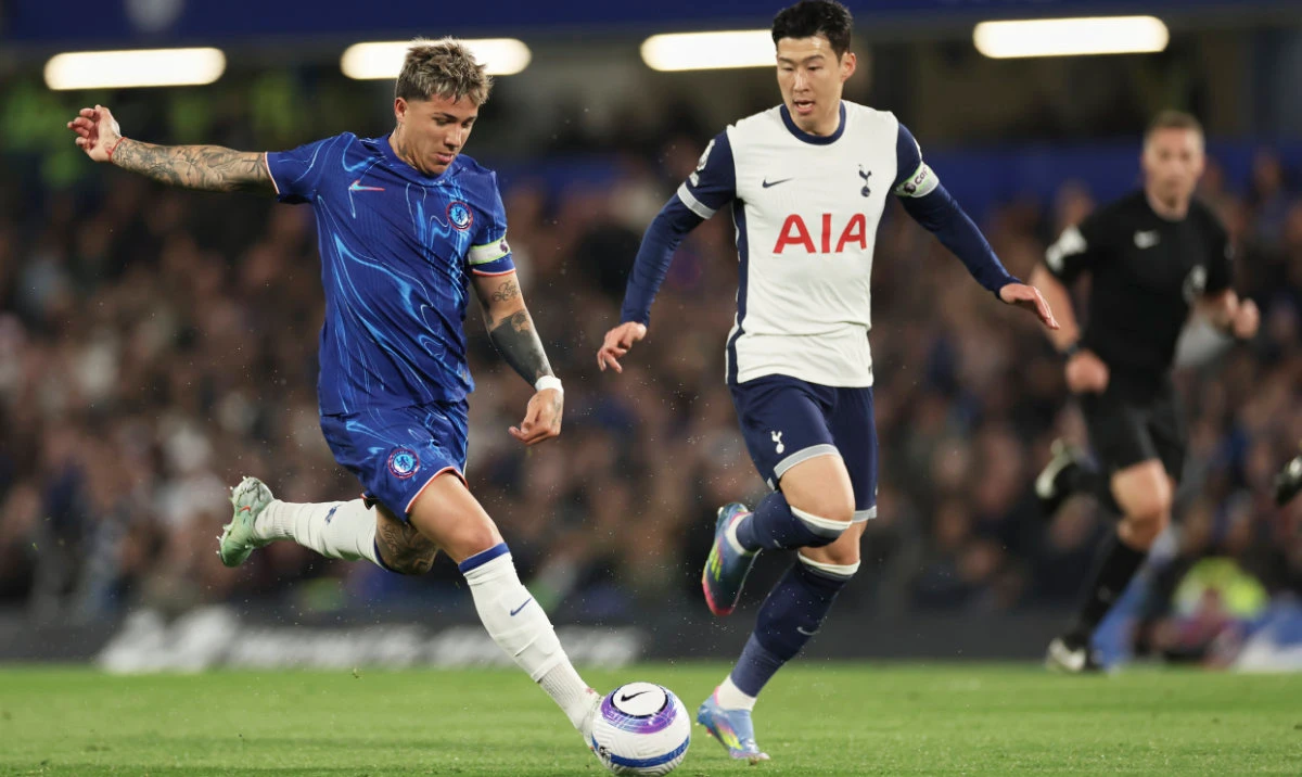 Chelsea's Enzo Fernandez, left, and Tottenham's Son Heung-min vie for the ball during the English Premier League soccer match between Chelsea and Tottenham Hotspur, at Stamford Bridge stadium, in London, Thursday, April 3, 2025. (AP)