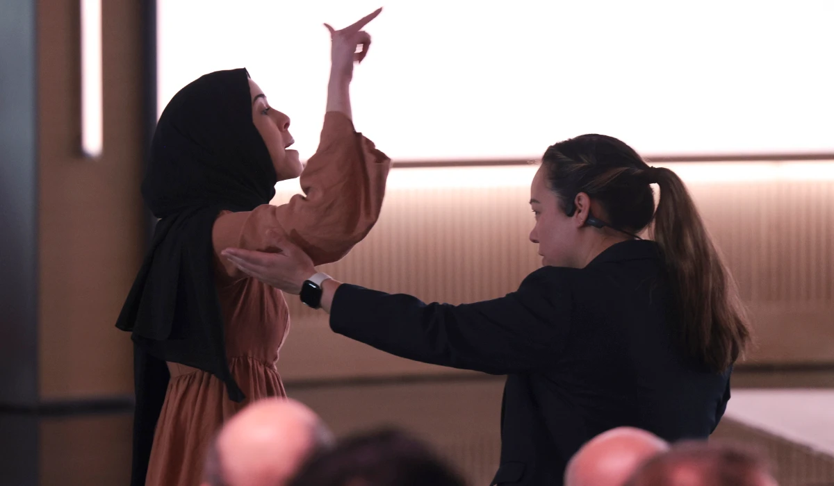 A pro-Palestinian demonstrator is escorted away by security as they interrupt Microsoft AI CEO Mustafa Suleyman during a presentation of the company's AI assistant, Copilot, ahead of a 50th Anniversary presentation at Microsoft headquarters, Friday, April 4, 2025, in Redmond, Wash. (AP)