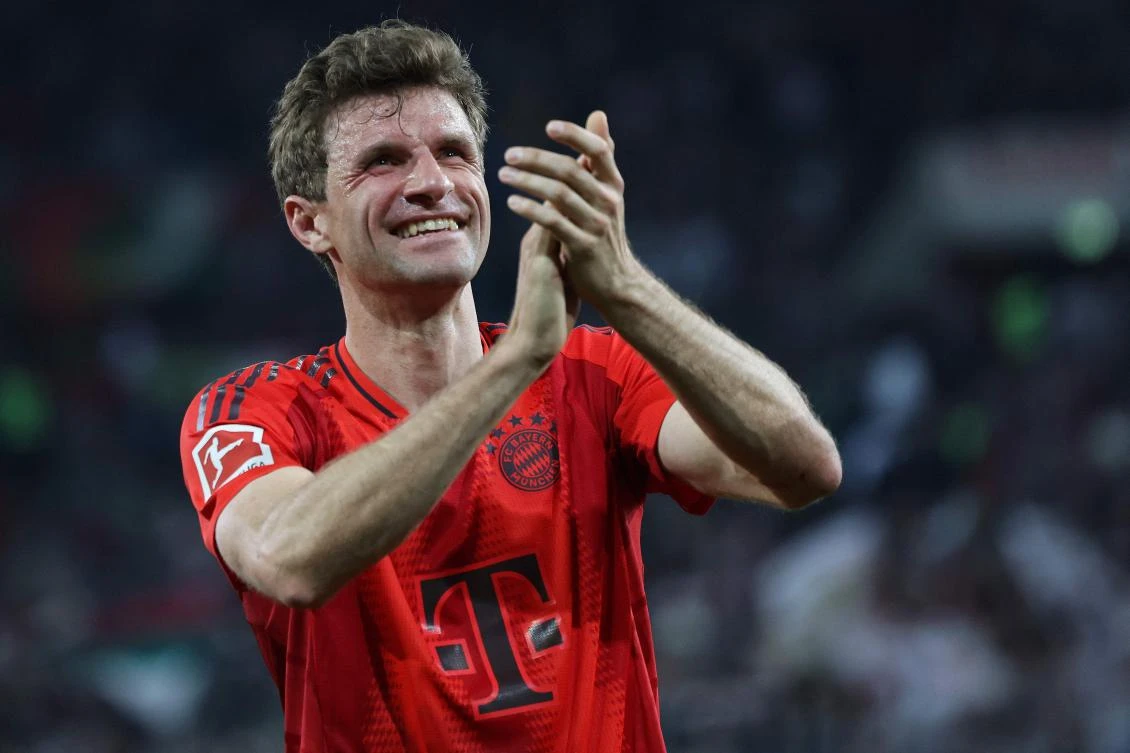 Bayern Munich's German forward #25 Thomas Mueller celebrates after the German first division Bundesliga football match between FC Augsburg and FC Bayern Munich in Augsburg, southern Germany, on April 4, 2025. (AFP)