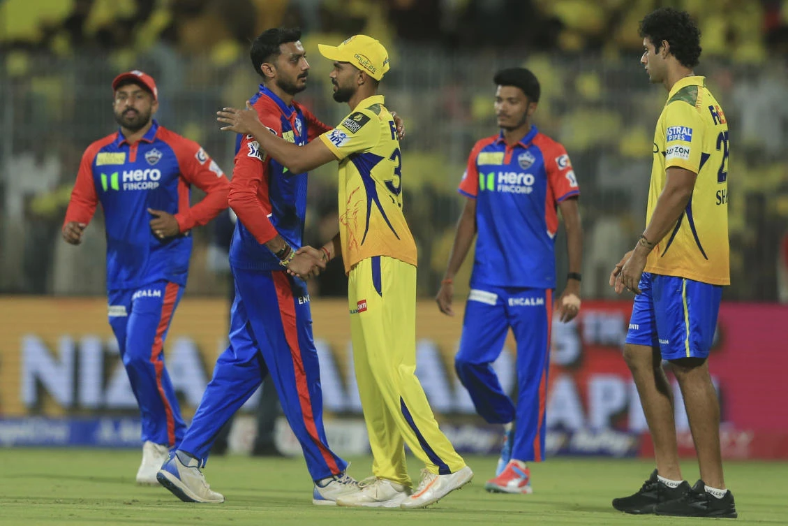 Delhi Capitals’ captain Axar Patel, second left, shake hands with Chennai Super Kings’ captain Ruturaj Gaikwad after winning the Indian Premier League match against Chennai Super Kings at M. A. Chidambaram Stadium in Chennai, India, Saturday, April 5, 2025. (AP)