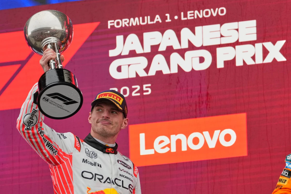 Red Bull driver Max Verstappen of the Netherlands celebrates with his trophy on the podium after the Japanese Formula One Grand Prix at the Suzuka Circuit in Suzuka, central Japan, Sunday, April 6, 2025. (AP)
