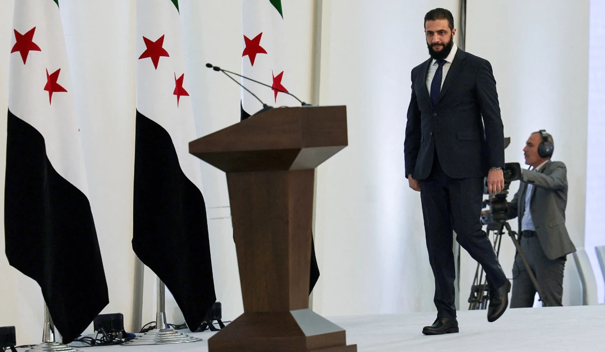 Syria's interim President Ahmed al-Sharaa walks ahead of speaking during a Ministerial formation of the government of the Syrian Arab Republic, in Damascus, Syria March 29, 2025. (REUTERS)