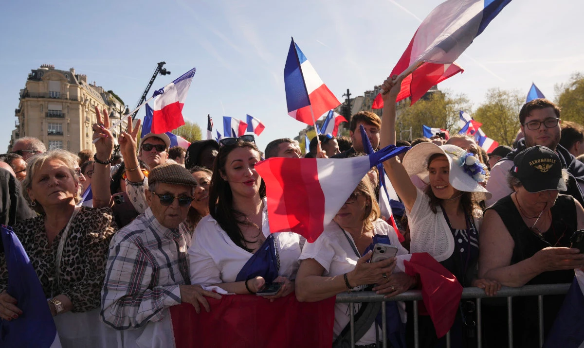 People attend at the French far-right party national rally in support of Marine Le Pen near the parliament in Paris, Sunday, April 6, 2025. (AP)