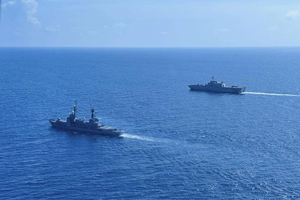 The BRP Gregorio Del Pilar, left, and USS Gabrielle Giffords sail together a military exercise in the disputed South China Sea on Feb. 9, 2024. (Armed Forces of the Philippines-Western Command/AFP)