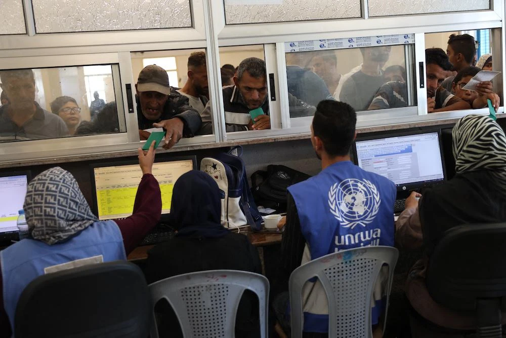 Palestinians queue to receive medicine at the UNRWA Japanese Health Center in Khan Yunis on the southern Gaza Strip on Oct. 29, 2024. (AFP file photo)