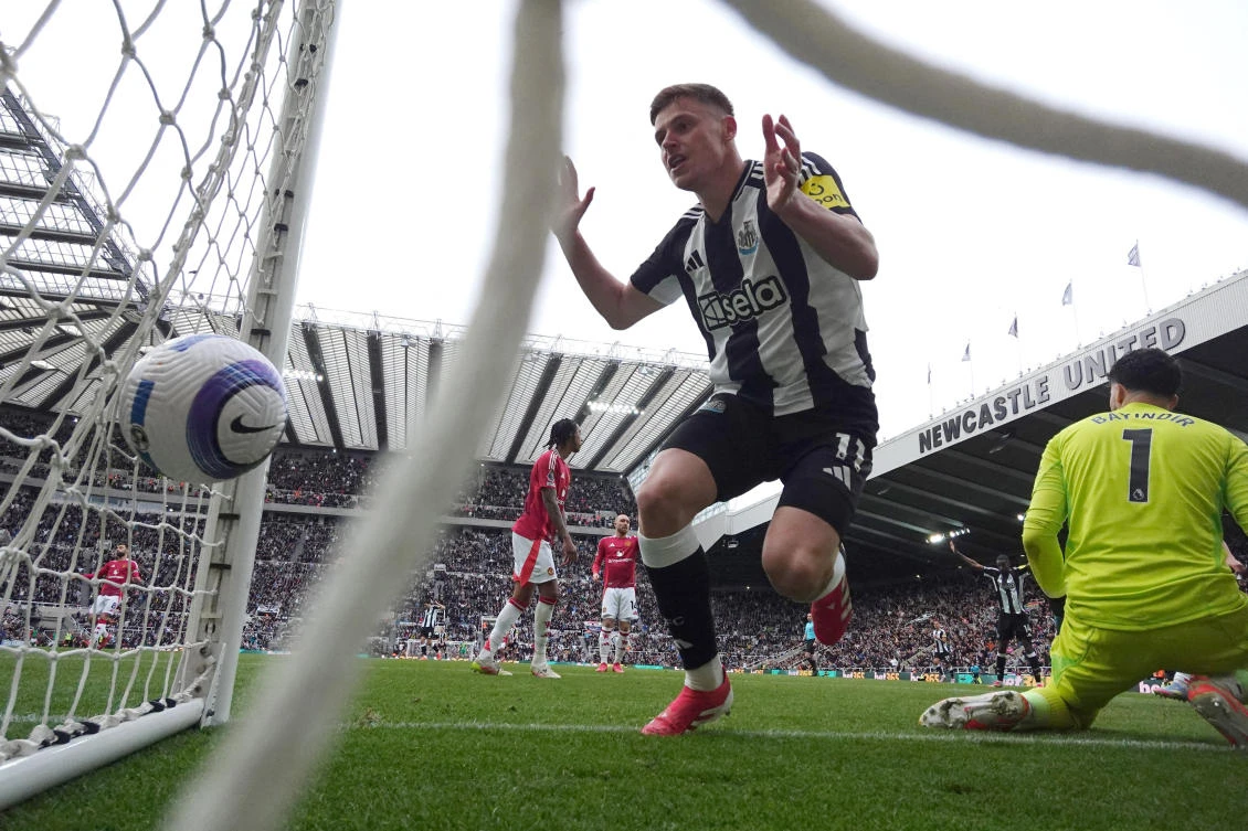 Newcastle United’s Harvey Barnes scores their second goal past Manchester United’s Altay Bayindir. (Action Images via Reuters)