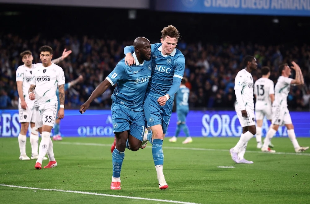 Napoli’s Romelu Lukaku celebrates scoring their second goal with Scott McTominay during the Serie A football match between Napoli and Empoli at Stadio Diego Armando Maradona Monday (Reuters)