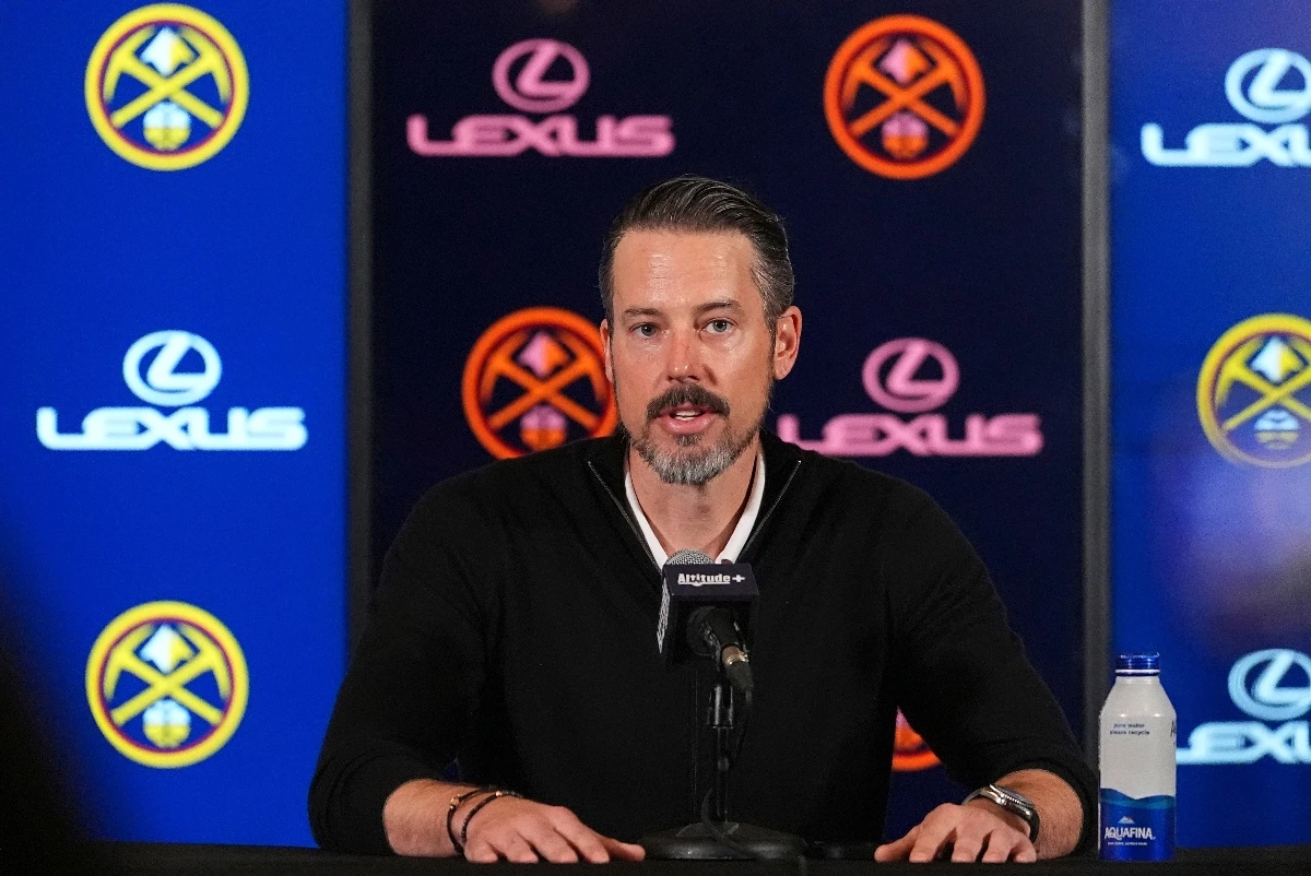 Denver Nuggets team president Josh Kroenke responds to questions at a news conference Monday in Denver about the firing of the team's general manager and head coach last week. (AP)